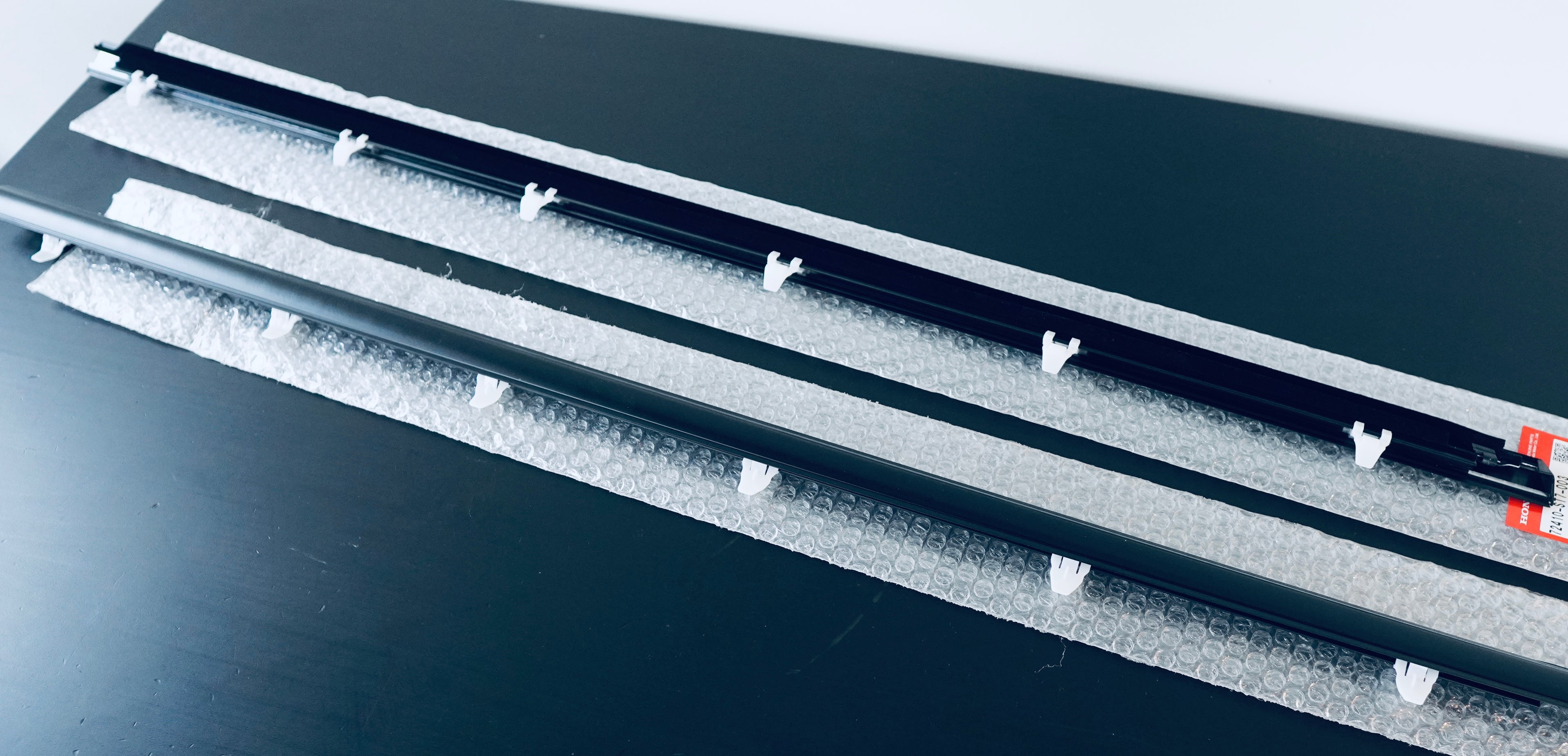 94-01 ACURA INTEGRA GENUINE BELT MOLDINGS (sold as a pair) 2DR